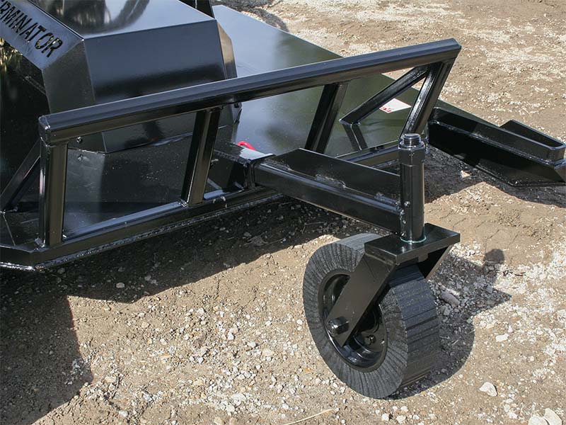 grace-manufacturing-tree-terminator-rotary-mower-skidsteer-attachment-3 Leveling wheel of Tree Terminator Rotary Mower, a brush mower attachment for skid steer.