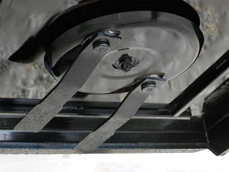 grace-manufacturing-tree-terminator-rotary-mower-skidsteer-attachment-4 Double edge blades of Tree Terminator Rotary Mower, a brush mower attachment for skid steer.